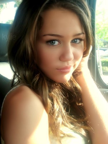 MIley Cyrus in her Car (personal)