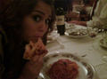 Miley Cyrus eating pizza - pizza photo