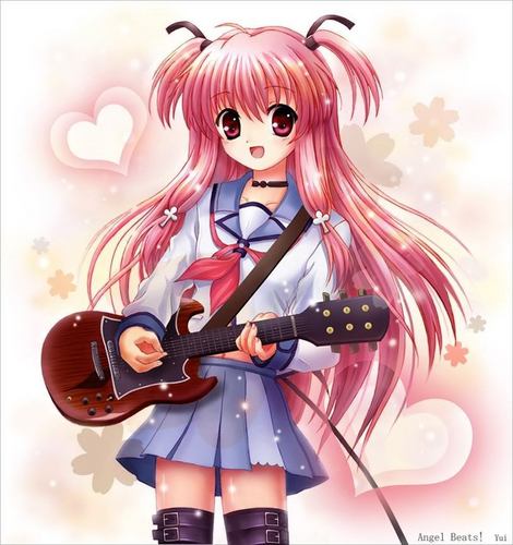 Yui playing her guitar