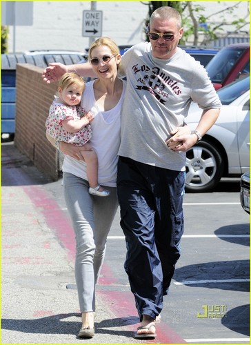  Kelly with new boyfriend Jason Bird and her daughter Helena
