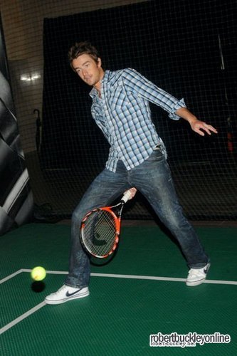Robert Buckley playing tennis