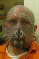 FULL FACE TATTOOED AND PIERCED UP - tattoos photo