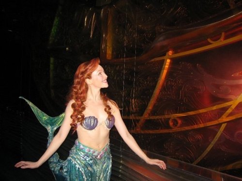 Michelle Lookadoo as Ariel next to ship