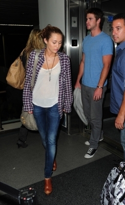 Miley Cyrus at LAX Airport (6.15.10)