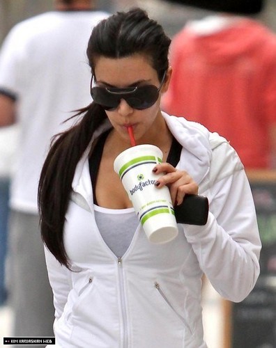 Kim is photographed as she grabs a smoothie post workout 6/26/10