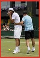 small  man rises high Rafa! - tennis photo