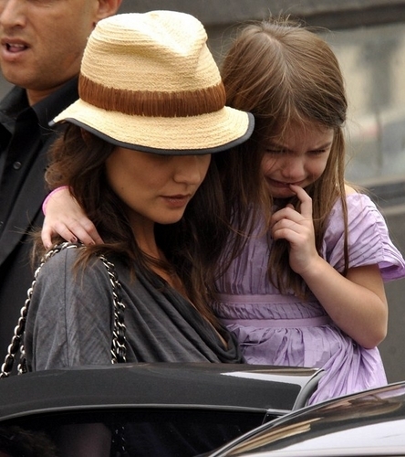 Katie Holmes and Suri Cruise upset leaving a photoshoot.