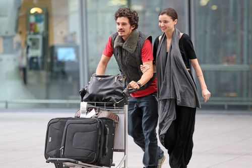  Orlando Bloom and Miranda Kerr at Heathrow Airport (July 9)