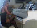 Lady Gaga playing John Lennon's old piano.  - lady-gaga photo