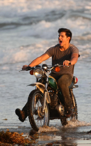  Taylor Lautner at BEach Photoshoot