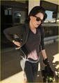 Kristen Stewart makes her way through LAX airport in Los Angeles - twilight-series photo