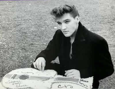  Elvis Presley- with a WELCOME BACK ELVIS cake