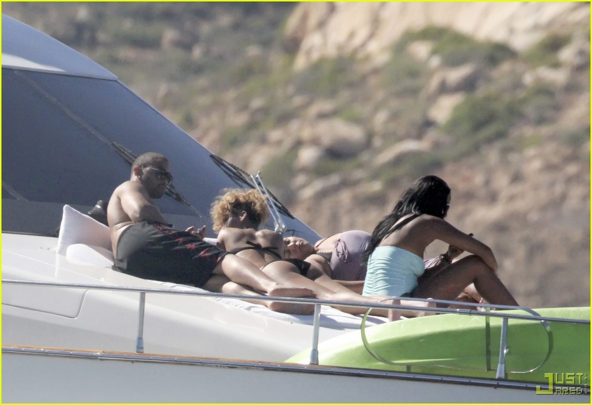 Photo of Rihanna with Matt Kemp on a Boat for fans of Rihanna. 