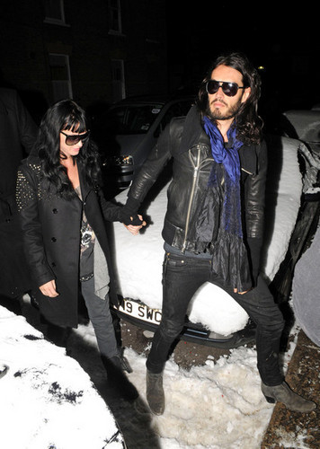  Katy Perry and Russell Brand arriving in London (Jan 9th)