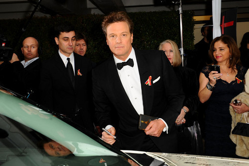  Colin Firth signing car for charity at 67th Annual Golden Globe Awards