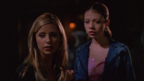  While Buffy was giving Lessons with Dawn: What was the name on Tombstone when Dawn roll-over the vampire from blocking?
