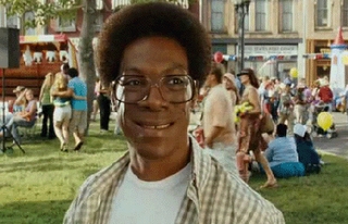  What song was playing when Norbit got hit in the head por the big speaker?