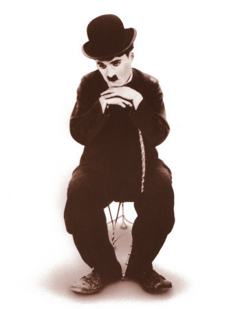  Complete this Charlie Chaplin's quote : "A ngày without laughter is ____________."