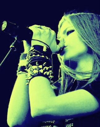 Avril lives with her band like a.....
