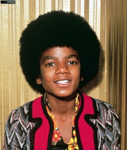  How old was Michael when his first solo album was released?
