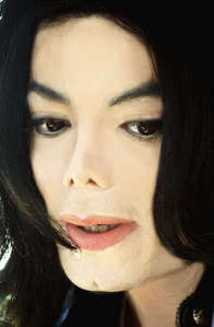 Which was the first single from Invincible album?