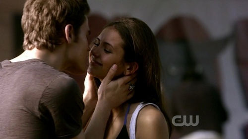 Who is looking at Elena and Stefan at this moment?