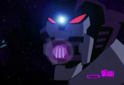  With what words does Starscream first unfold his face into a sonic blaster weapon?