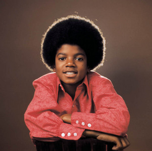  Of whom posters were in Michael's bedroom when he was a kid ?