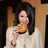 selena  with a cookie luv13212 photo