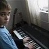 me at my dads house playing piano JustinDBRL photo