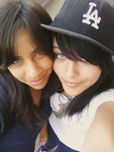  am da gurl on the left! right one is celina :] i look weirdd in this one!!! O.o