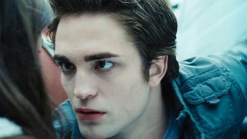 It's just at the same time when Edward stares at Bella when he saves her from Tyler's car.
It continues while he jups Bella's truck to run away from there and then the camera focuses on Bella and all her friends (and other students and professors) come to see how is her.

And finally it beggins again starting the hospital scene when Charlie enters to see how's Bella and then doesn't sound more.