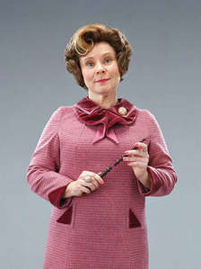 The Only Character I Can Think Of Now Is   Dolores Umbridge From Harry Potter and the Order of the Pheonix.