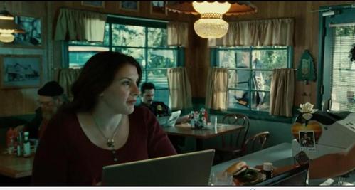  LOL yea it is actually Stephenie Meyer =) i noticed right the first time i saw the movie she had to appear and i hope she appears on New Moon as well it would be cool =D