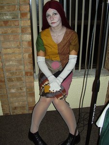  i've seen the costume. i was disappointed that it's just tied up at the back and there aren't any patches on the back either. i was Sally two years ago, but i made my own costume. (see below.)