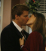 Yes, Booth and Brennan kiss in Season 3 Episode 9: Santa in the Slush. You should watch it online if you get the chance because it is a very lovely episode. And I'm terribly sorry that you guys haven't gotten that far yet. I'd probably die if I had to wait so long for new episodes to air so props to you! 
