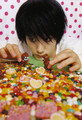 L playing with his candy - l photo