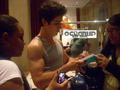 Flexin while signing autographs - david-henrie photo