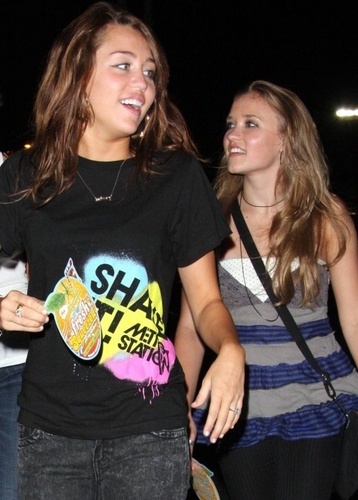  Emily Osment and Miley Cyrus