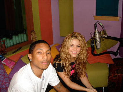  with Pharell Williams at a recording studio