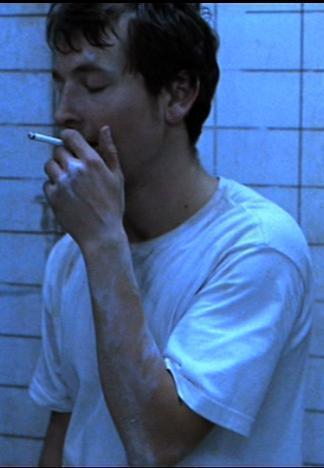 James Wan smoking a cigarette (or weed)
