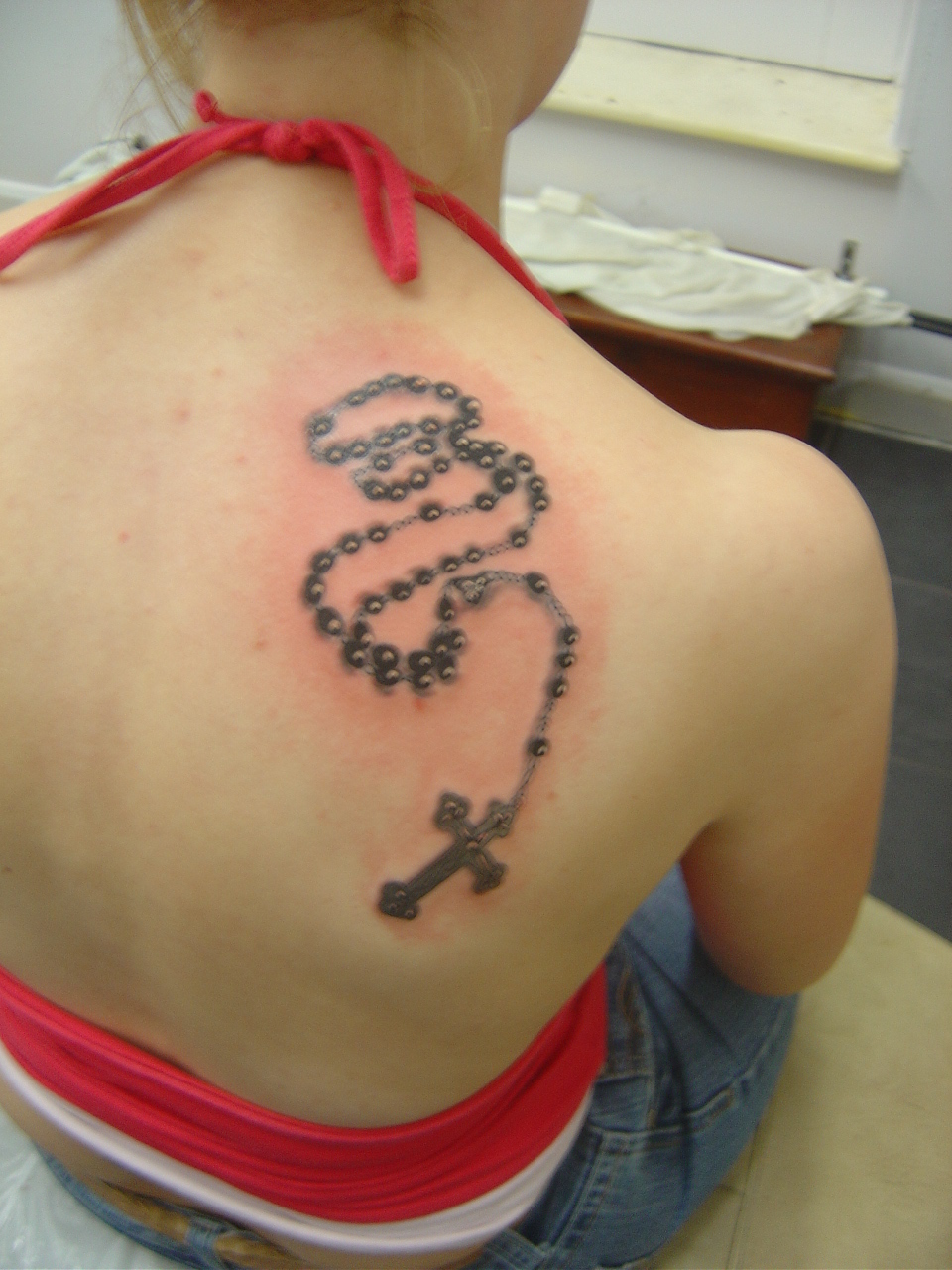 Cross and beads Tattoos
