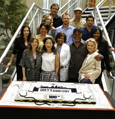  Cast Picture on Set with 100 Episode