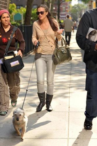 Leighton walking her dog on set