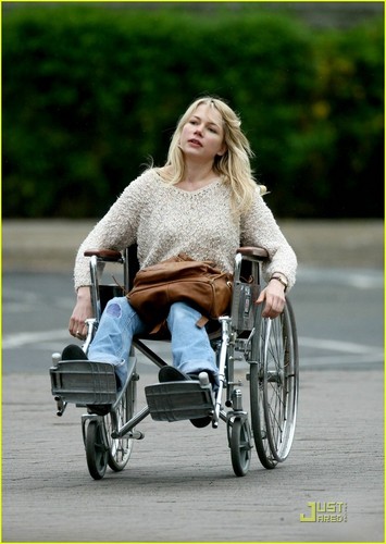  Michelle in a wheelchair on the set of her new film Blue Valentine