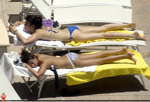 Ashley relaxes poolside at her Miami hotel with friends - May 11