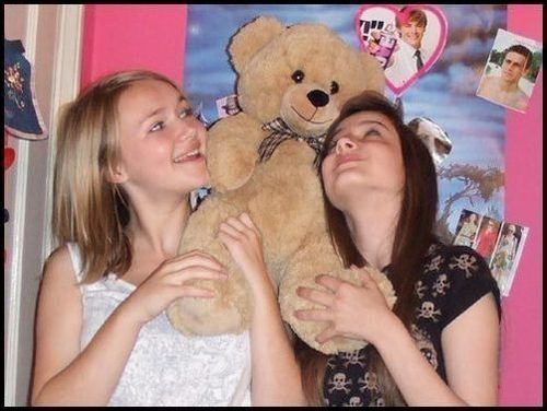 Lucy and Lauren with a big brown teddy