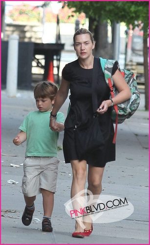  Kate Winslet walks with her kids