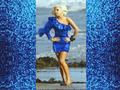 lady-gaga - Lady Gaga in blue on the beach wallpaper