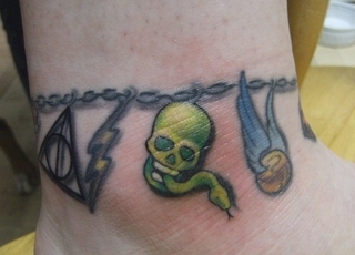  I´m glad i´m not the only one! HP tatoos *